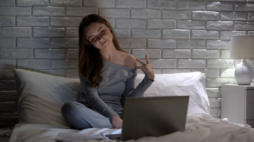 Sexy Woman Showing Shoulder Chatting With Boyfriend Via App In Laptop Picture Id1172312575